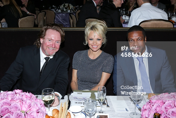 Executive Director of J/P HRO Ron Baldwin, actress Pamela Anderson and actor Chris Tucker