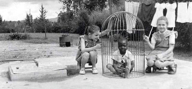 An African child in a cage in 1955